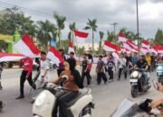 PETA Aceh Tamiang Longmarch Usung Bendera Merah Putih Sepanjang 30 Meter