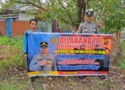 DALAM UPAYA PENCEGAHAN KEBAKARAN HUTAN DAN LAHAN, PERSONEL POLSEK PULAU PETAK SOSIALISASIKAN SANKSI PIDANA PELAKU KARHUTLA KE MASYARAKAT KECAMATAN PULAU PETAK