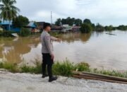 Personel Polsek Sepang Lakukan Deteksi Dini Bencana Alam di DAS Kahayan