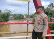 Cegah Bencana Sejak Dini, Polsek Manuhing Intensifkan Monitoring Titik Rawan Luapan Air